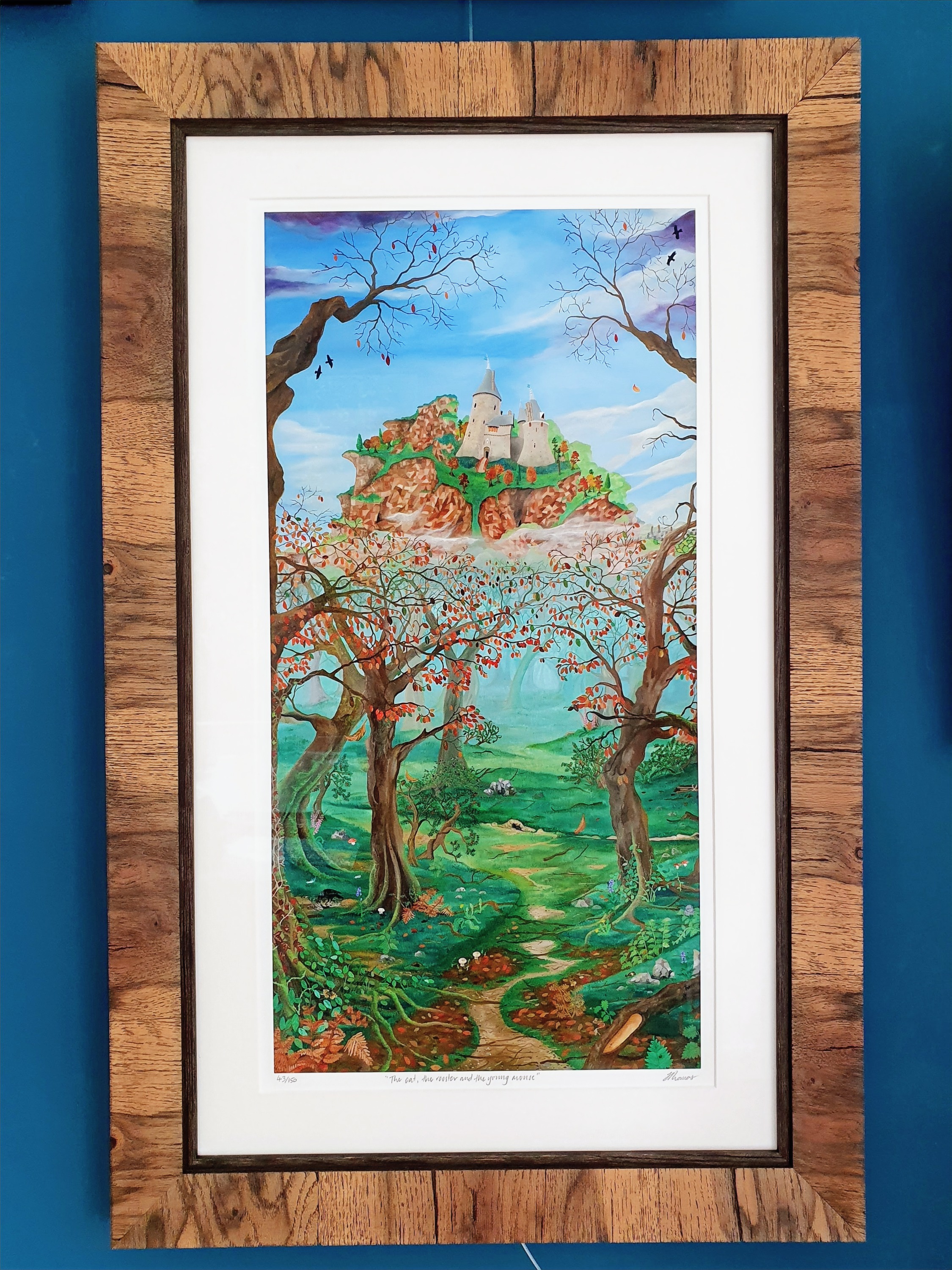 Signed limited-edition print of a hilltop castle framed in a broad oak moulding